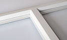 Close-Up Photo of White Avante Collection Garage Door Glass