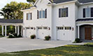 Coachman Collection Garage Doors with White Home 