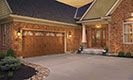 Clopay Gallery Collection - Long Panel Design with Wrought Iron Arch Windows 